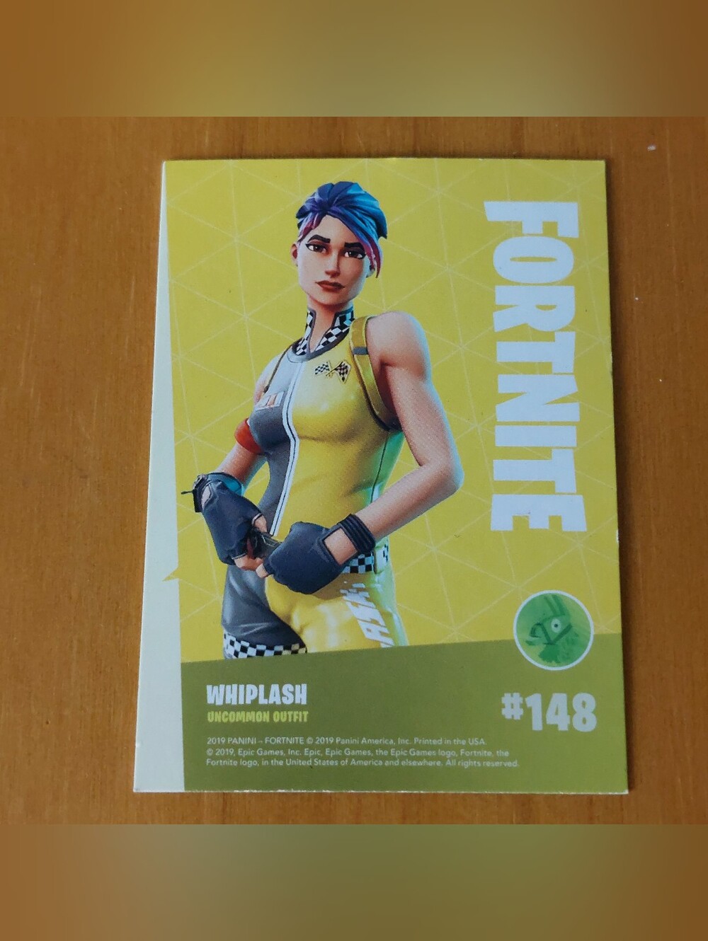 2019 Panini Fortnite Whiplash (#148) uncommon outfit trading card.